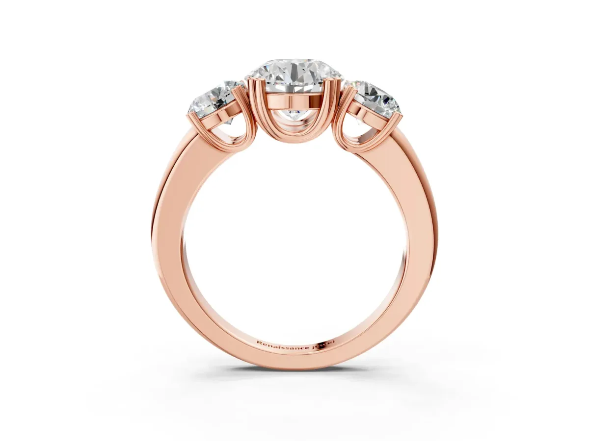 Three-Stone Round Cut Cut Diamond Ring with Channel Set Band and Four-Prong Setting Rose gold