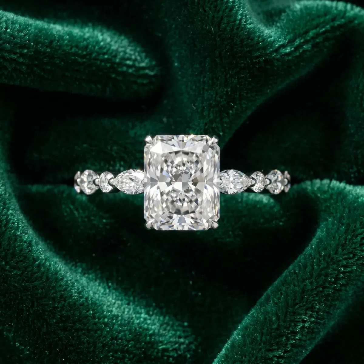 Radiant Cut Diamond Ring with Marquise and Round Side Stones and Four-Prong Setting Silver