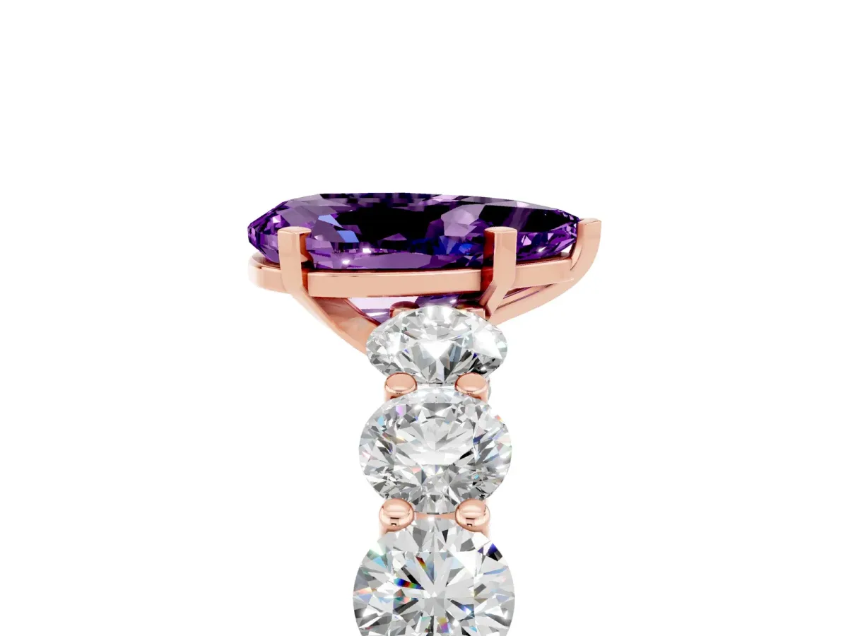 Pear Cut Amethyst Prong Setting with Side Stones on a Pave Band Rose gold