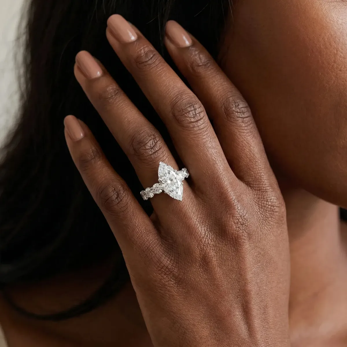 Marquise Cut Diamond Prong Setting with Side Stones on a Pave Band Silver