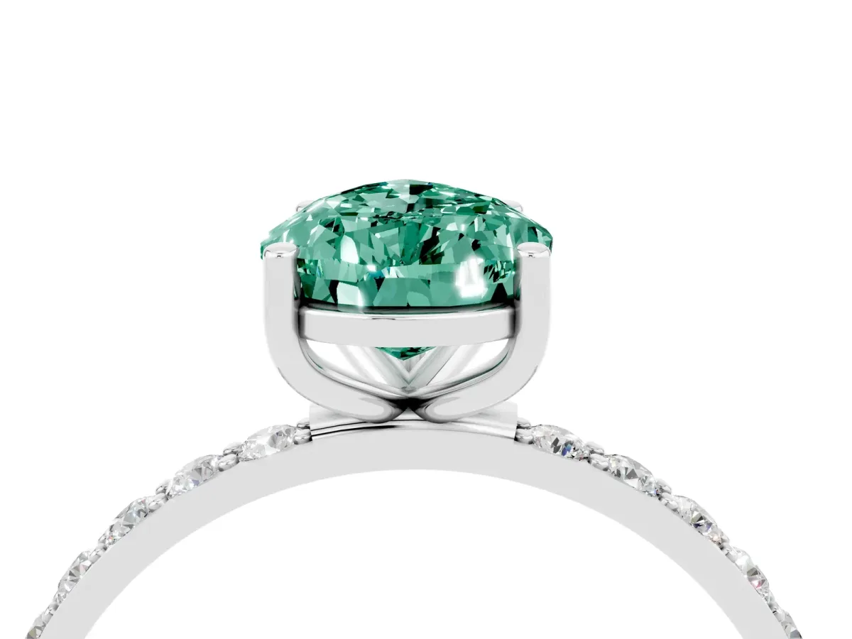 Pear Cut Green Sapphire Solitaire Ring with Round Pavé Band and Prong Setting Silver