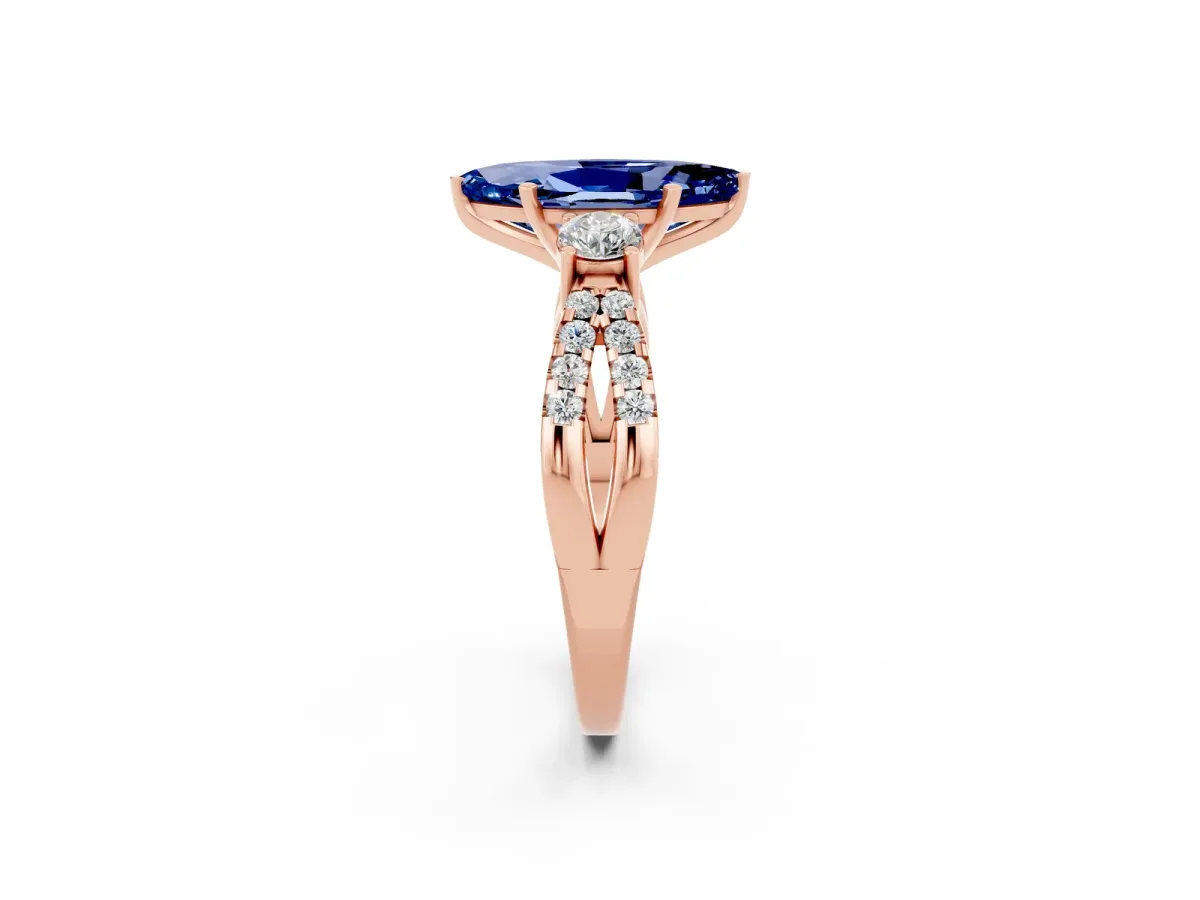 Marquise Cut Blue Sapphire Three-Stone Ring with Pavé Split Shank and Four-Prong Setting Rose gold