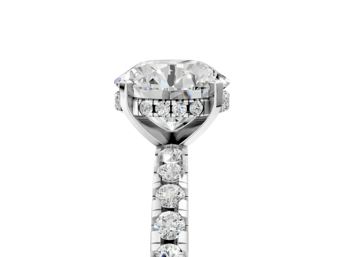 Round Cut Diamond Solitaire Ring with Round Tanzanite Pavé Band and Four-Prong Setting Silver