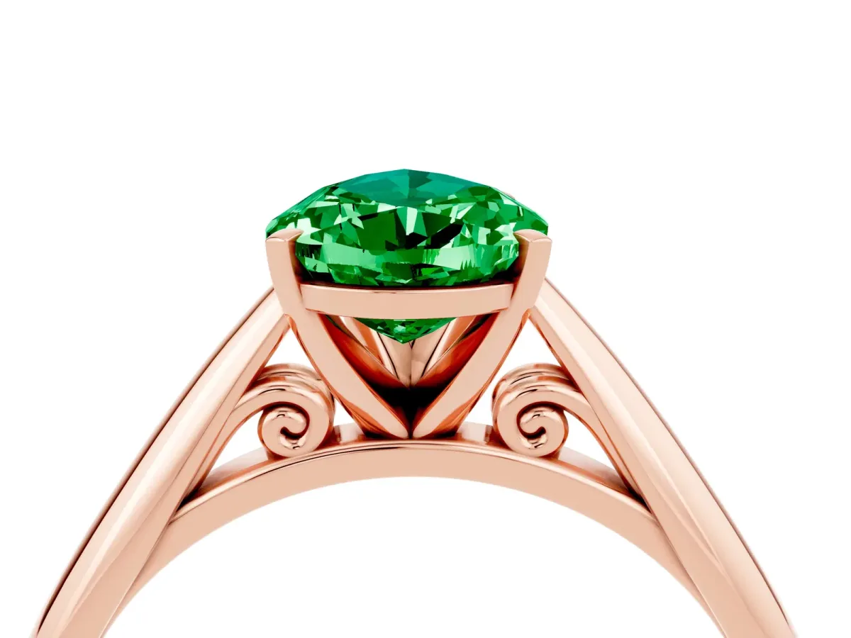 Pear Cut Emerald Solitaire Engagement Ring with Cathedral Setting and Four-Prong Mount Rose gold