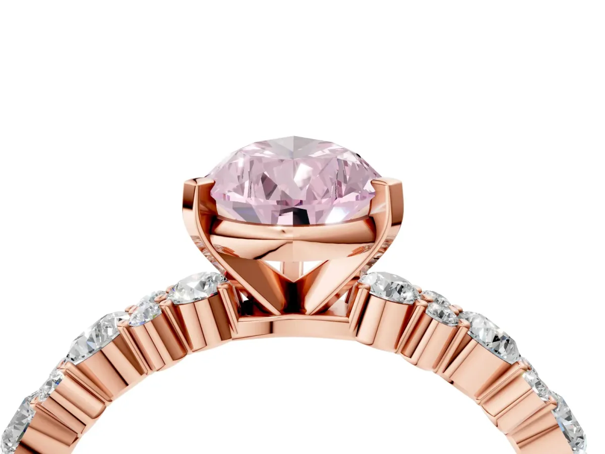 Fancy Pink Pear Cut Diamond Side Stone Solitaire Ring with Round and Four-Prong Setting Rose gold