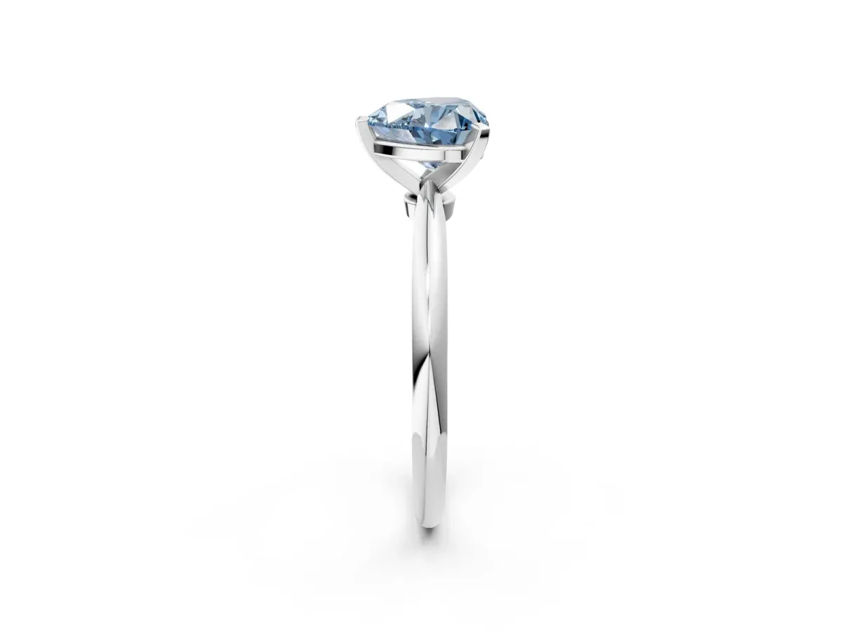 Fancy Blue Heart Cut Diamond Solitaire Ring with Six-Prong Setting and Classic Band Silver