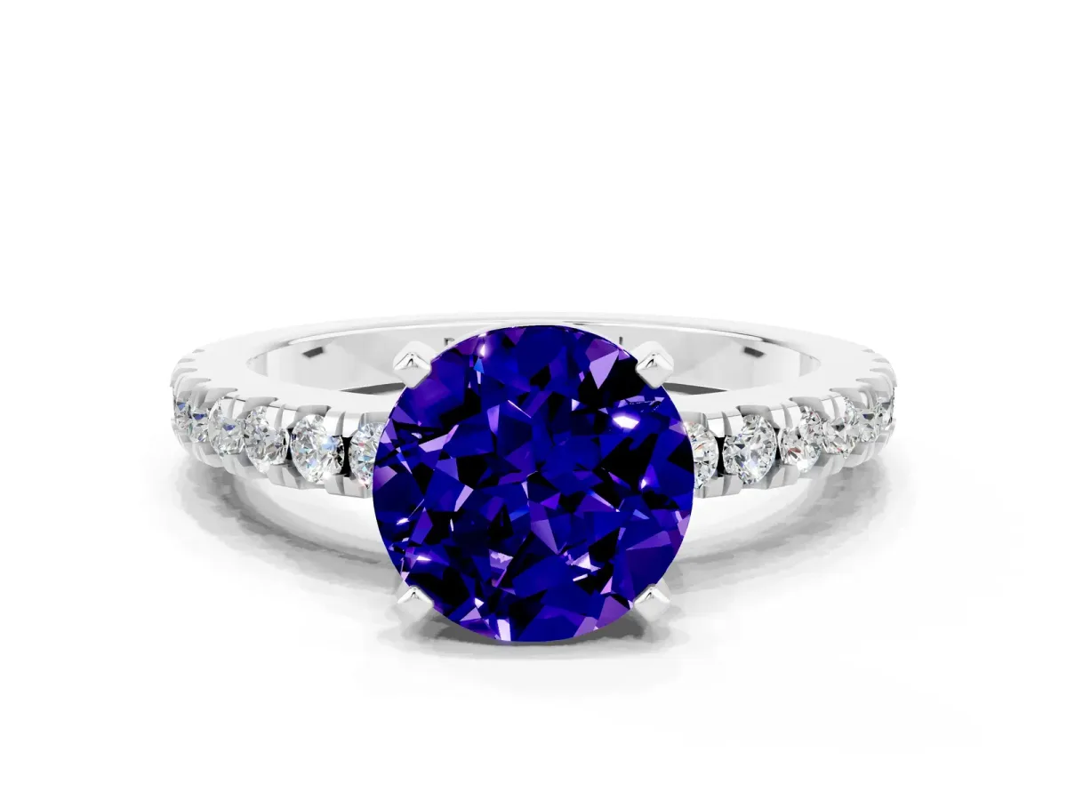 Round Cut Solitaire Tanzanite with Pavé Band and Four-Prong Setting Silver