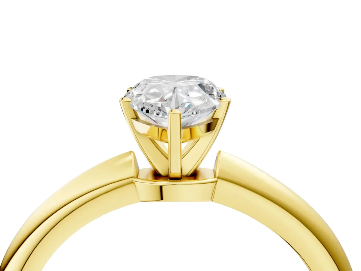 Pear Cut Diamond Solitaire Ring with Six-Prong Setting and Classic Band Yellow gold