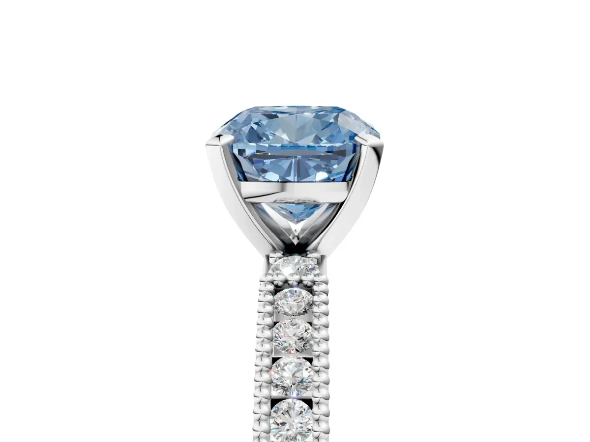 Fancy Blue Cushion Cut Solitaire with Pavé Band and Four-Prong Setting Silver