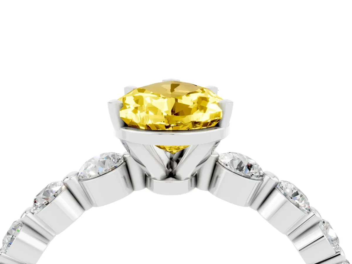 Pear Cut Solitaire Yellow Sapphire Ring with Pave Band and Four-Prong Setting Silver