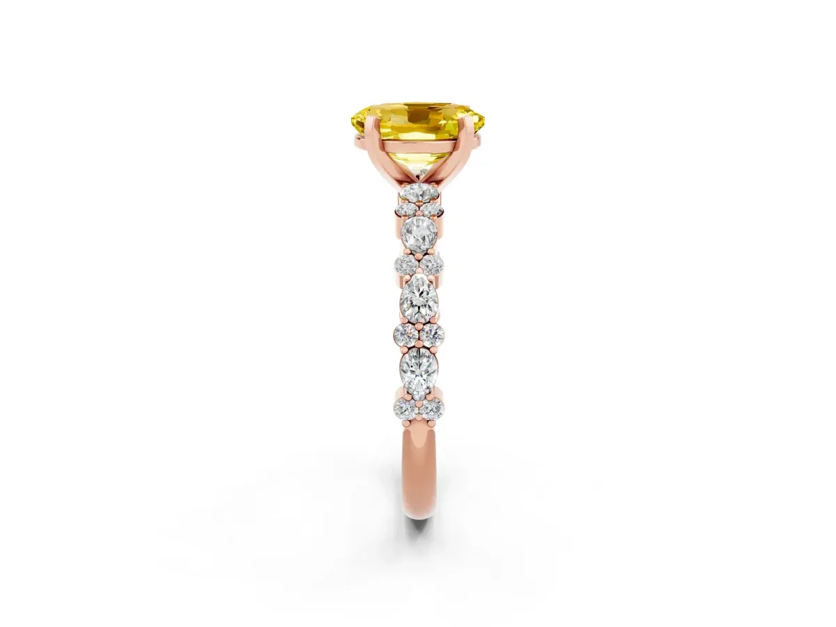 Oval Cut Yellow Sapphire Side Stone Solitaire Ring with Round and Four-Prong Setting Rose gold