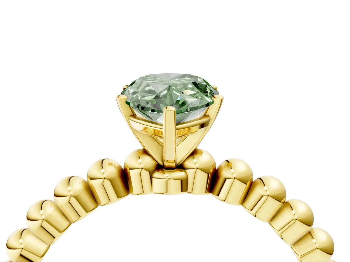 Fancy Green Pear Cut Diamond Solitaire Ring with Beaded Band and Prong Setting Yellow gold