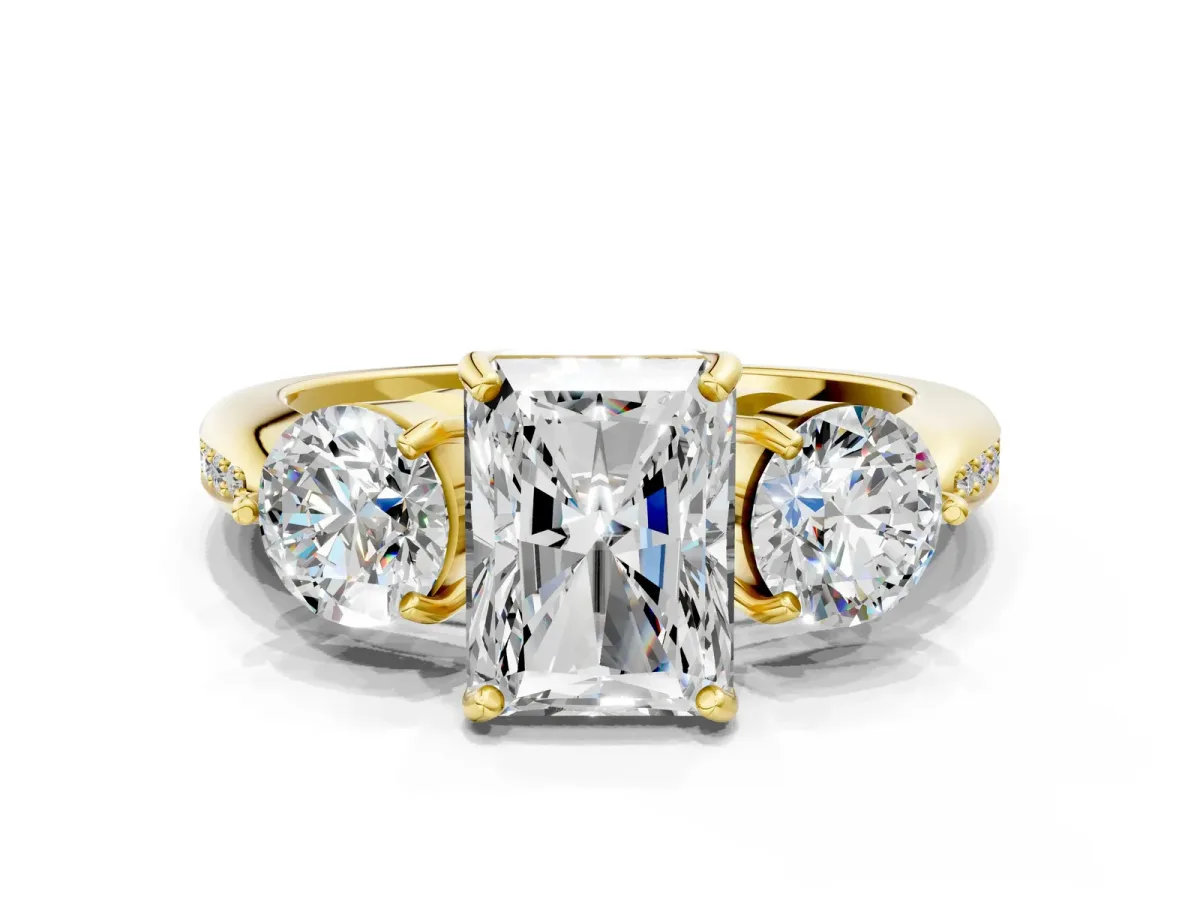 Three-Stone Radiant Cut Diamond Channel Set Engagement Ring with Prong Setting Yellow gold