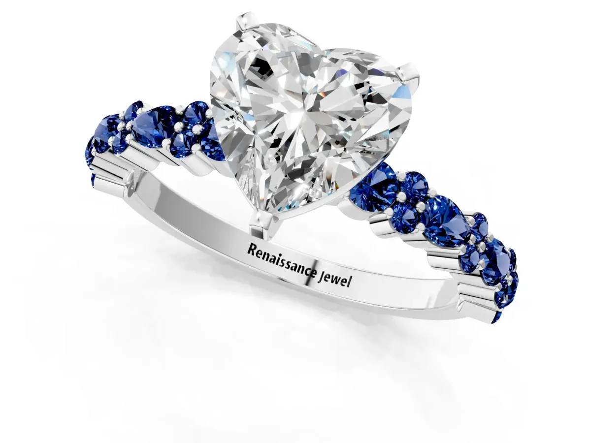Heart Cut Diamond Side Stone Solitaire Ring with Round Blue Sapphire and Four-Prong Setting Platinum