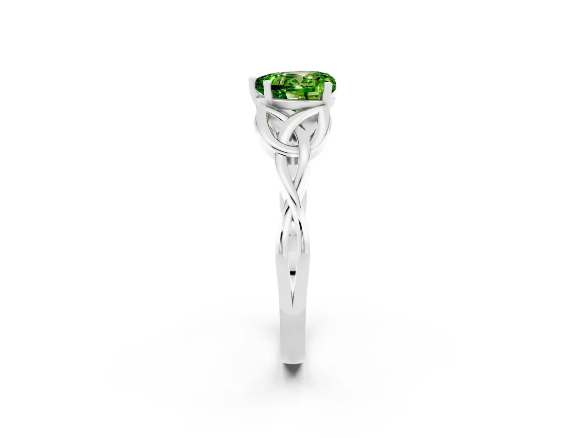 Heart Cut Peridot Solitaire Engagement Ring with Celtic Knot Band and Four-Prong Setting Silver