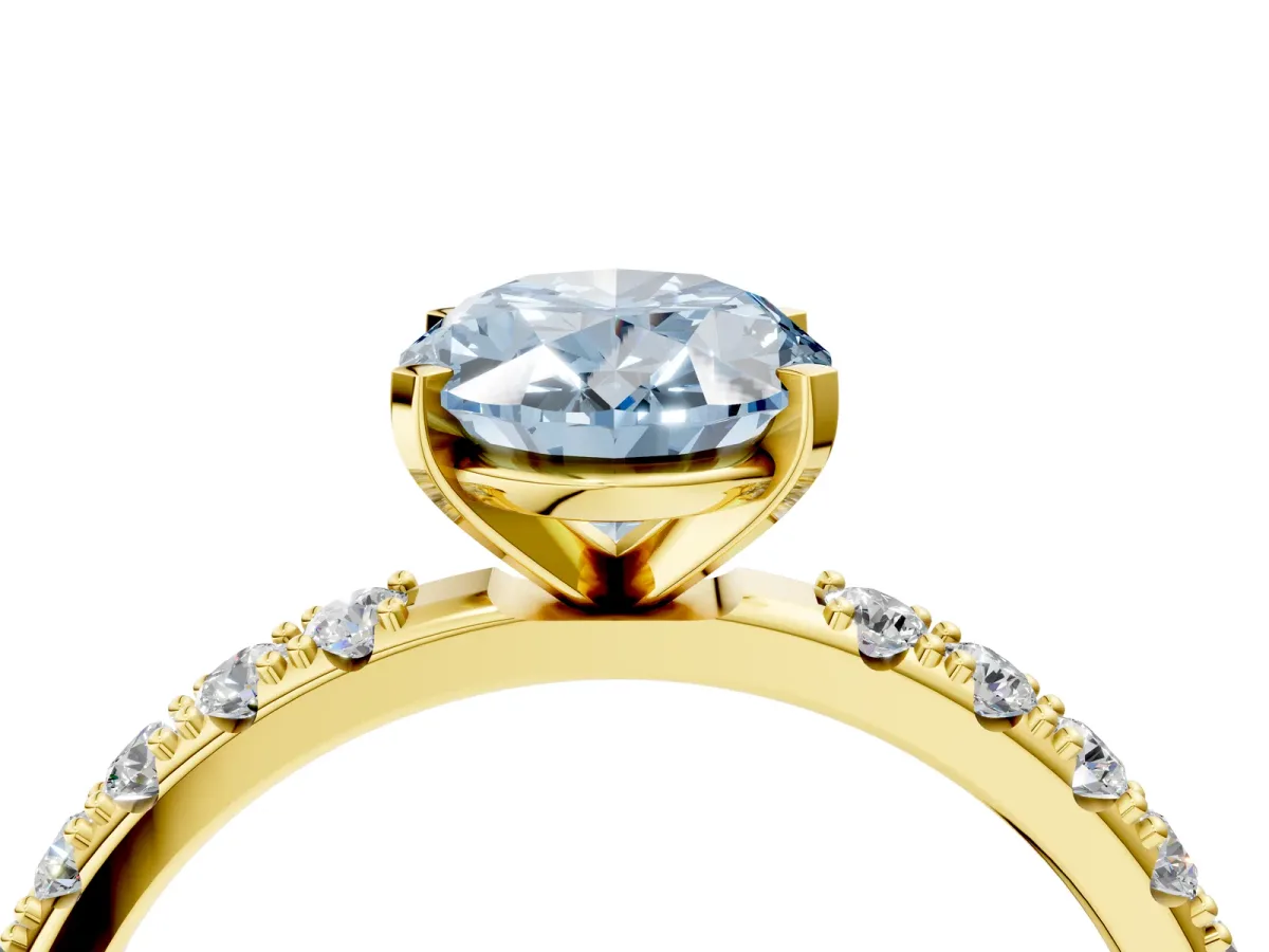 Fancy Blue Oval Cut Diamond Solitaire Pavé Band with Four-Prong Setting Yellow gold