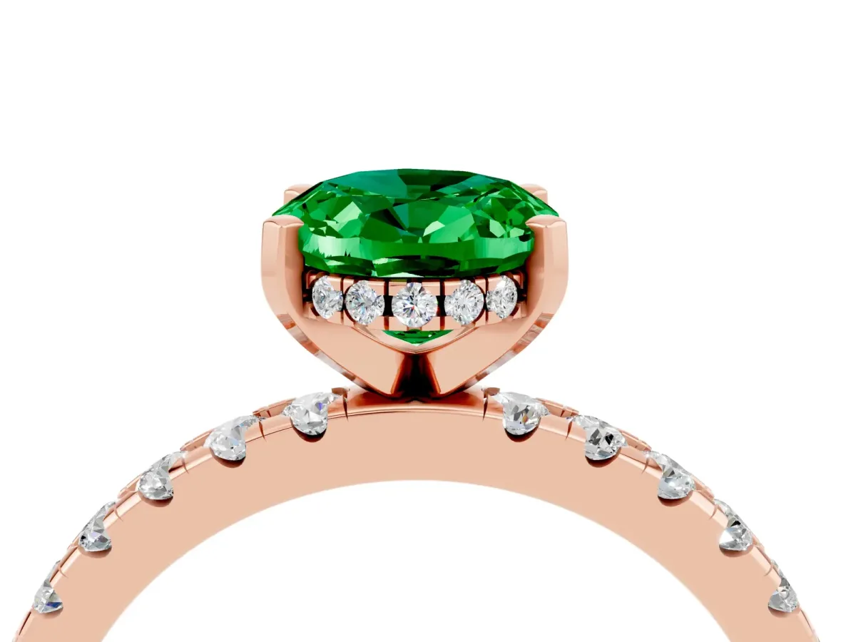 Oval Cut Emerald Solitaire Ring with Round Pavé Band and Four-Prong Setting Rose gold