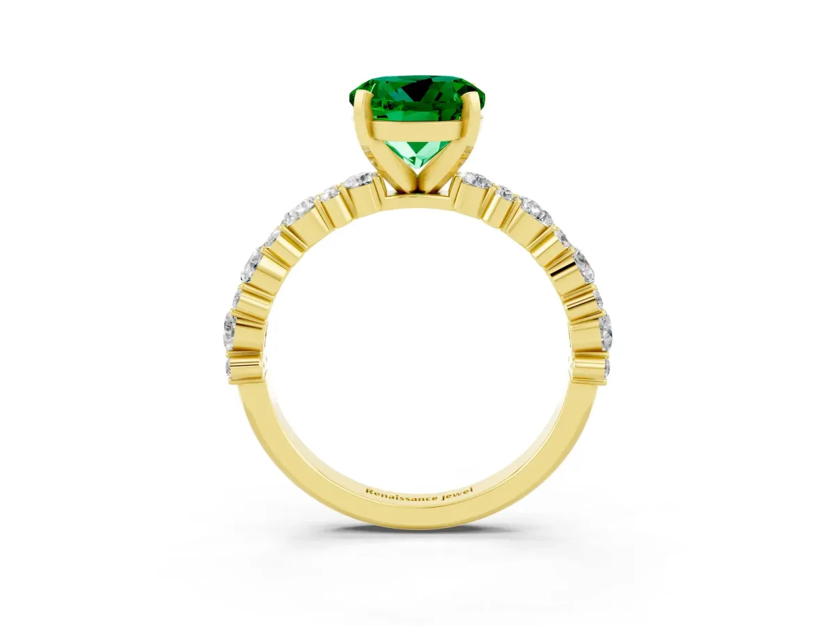 Round Cut Emerald Side Stone Solitaire Ring with Round and Four-Prong Setting Yellow gold