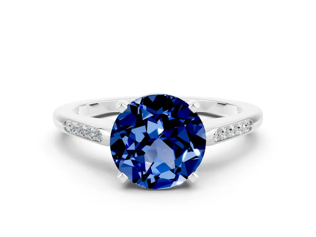 Round Cut Blue Sapphire Solitaire Ring with Channel Set Round Band and Prong Setting Silver