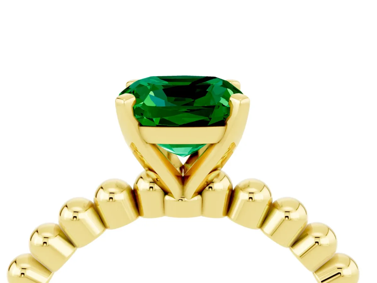 Cushion Cut Emerald Solitaire Ring with Beaded Band and Prong Setting Yellow gold