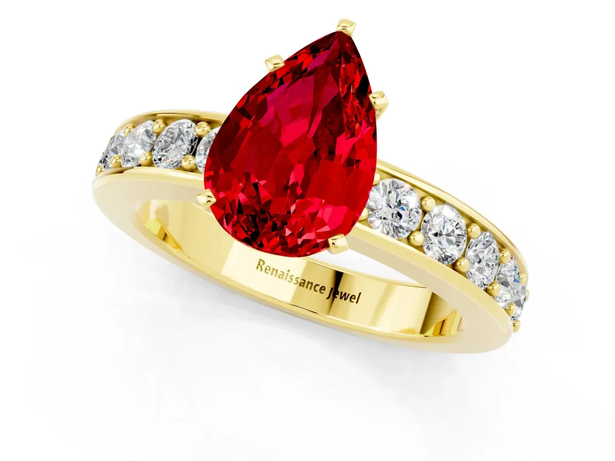 Pear Cut Ruby Engagement Ring with Channel Set Round Band and Prong Setting Yellow gold