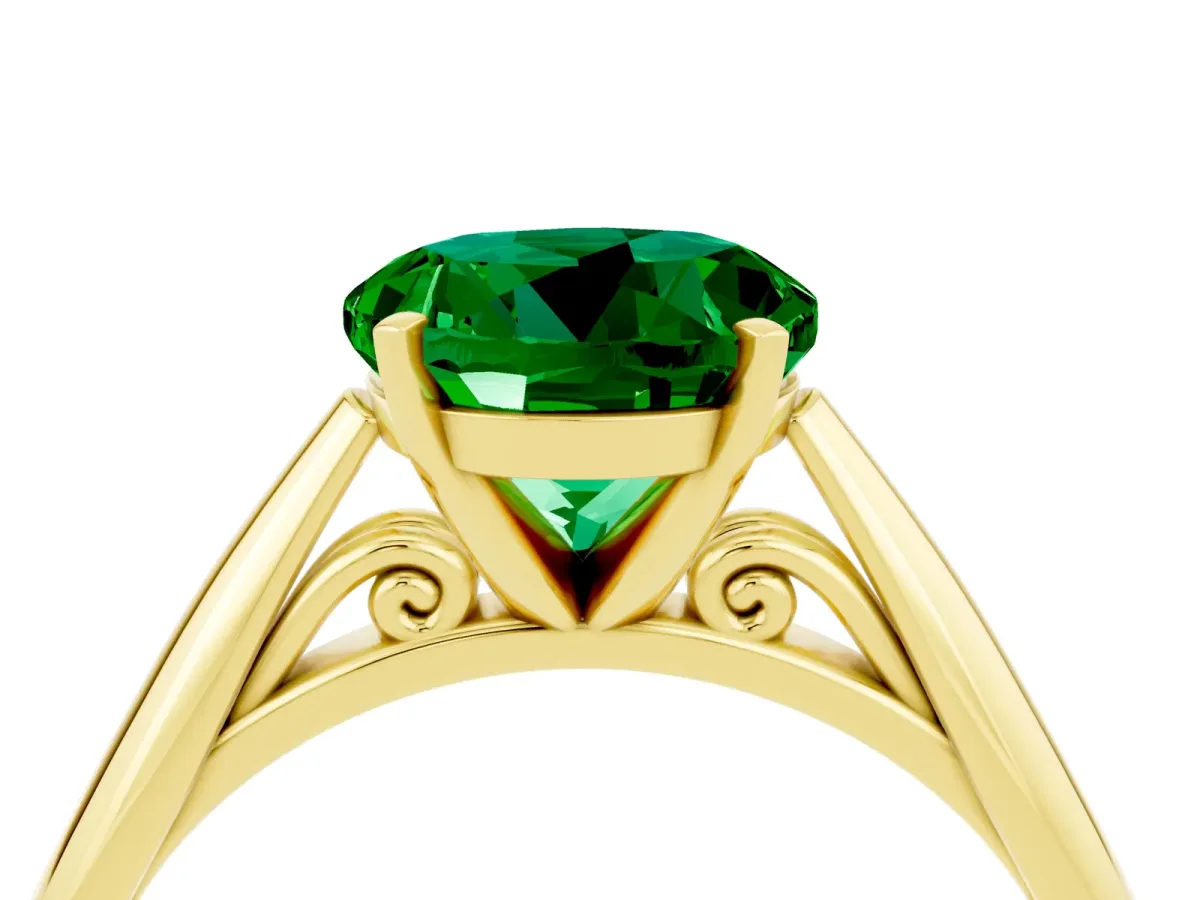 Round Cut Emerald Solitaire Engagement Ring with Cathedral Setting and Four-Prong Mount Yellow gold