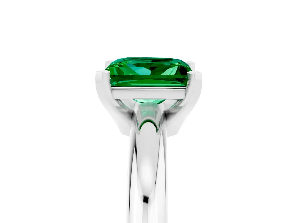 Princess Cut Emerald Solitaire Engagement Ring with Round Band and Four-Prong Setting Silver