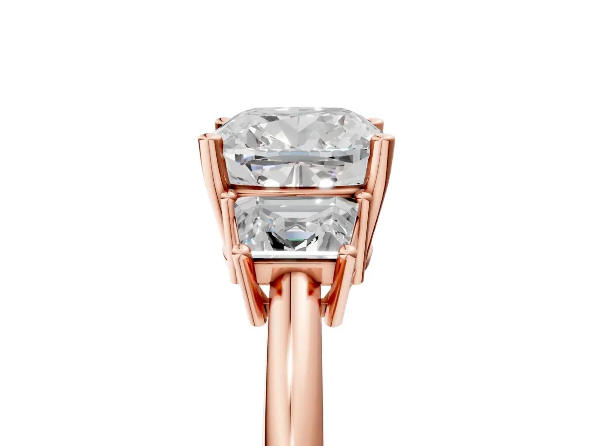 Cushion Cut Diamond Three-Stone Ring with Trapezoid Side Stones and Prong Setting Rose gold