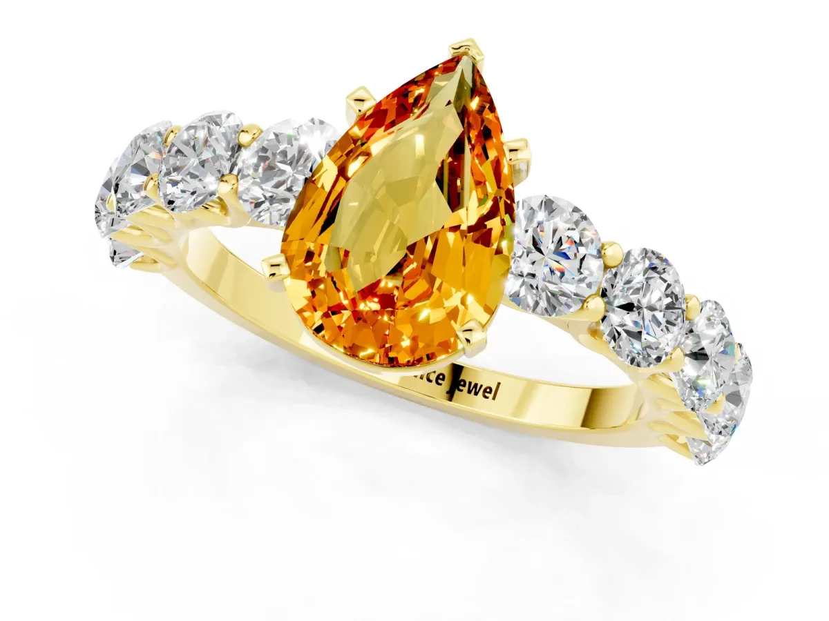 Pear Cut Citrine Prong Setting with Side Stones on a Pave Band Yellow gold