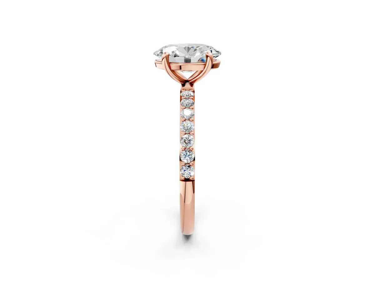 Oval Cut Diamond Solitaire Ring with Round Pavé Band and Prong Setting Rose gold