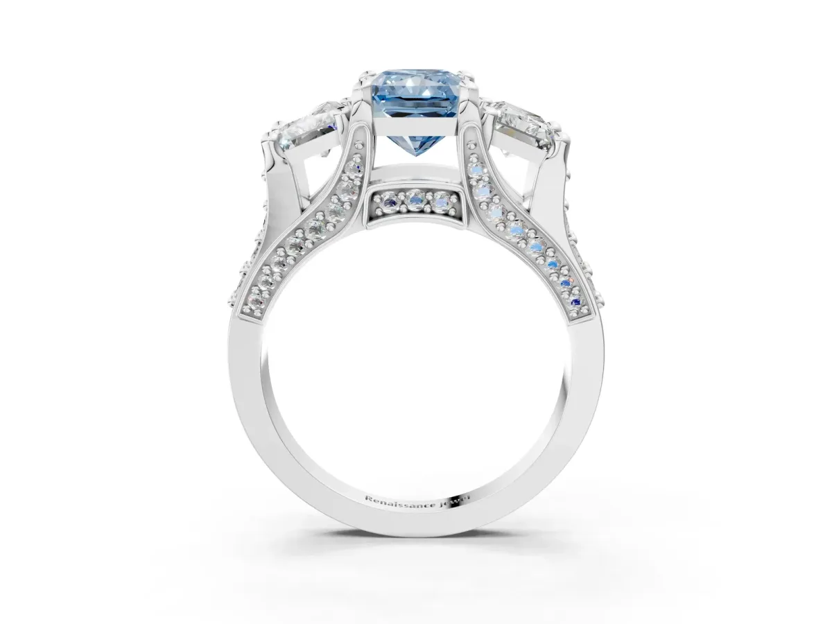 Fancy Blue Radiant Cut Diamond Three-Stone Ring with Channel Set Band and Four-Prong Setting Platinum