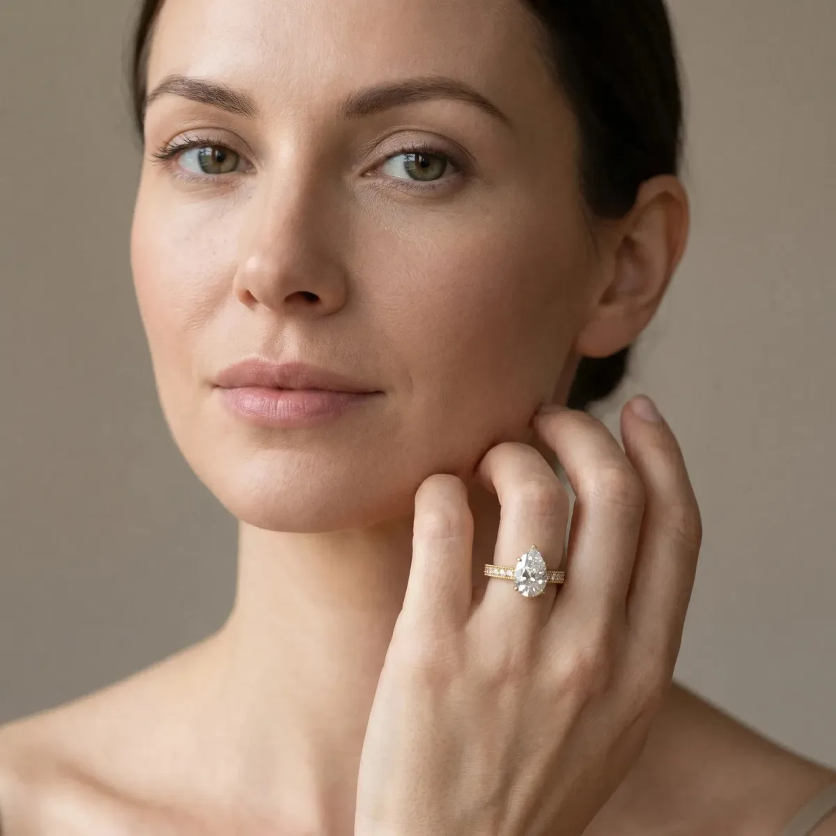 Pear Cut Solitaire with Pavé Band and Four-Prong Setting Yellow gold