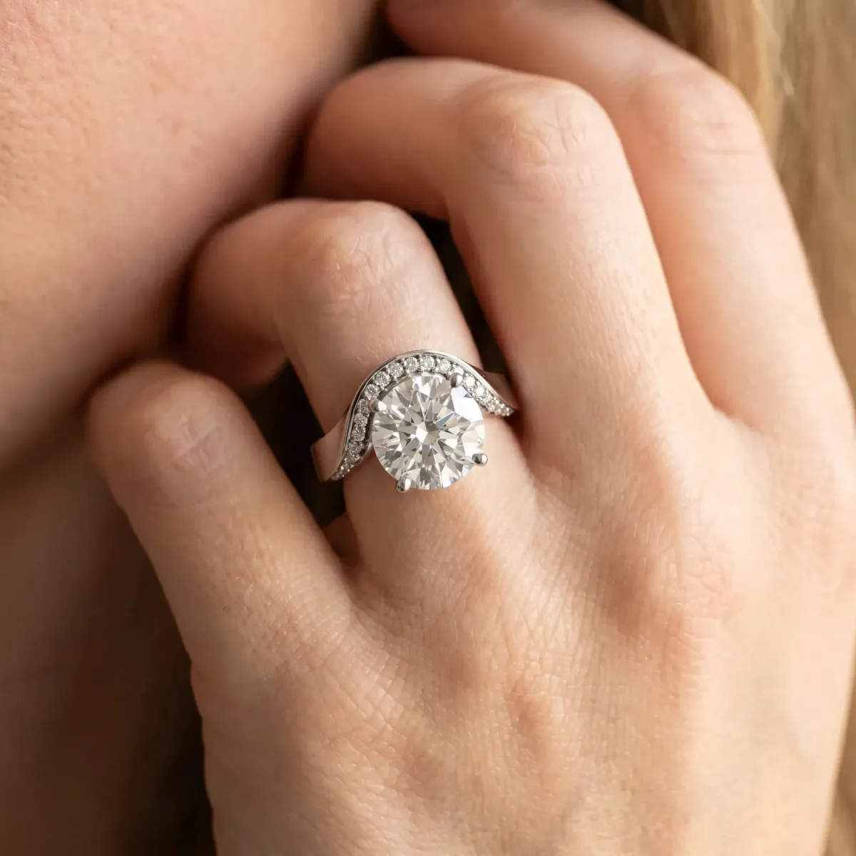 Round Cut Solitaire Diamond Engagement Ring with Pave Band and Four-Prong Setting Platinum