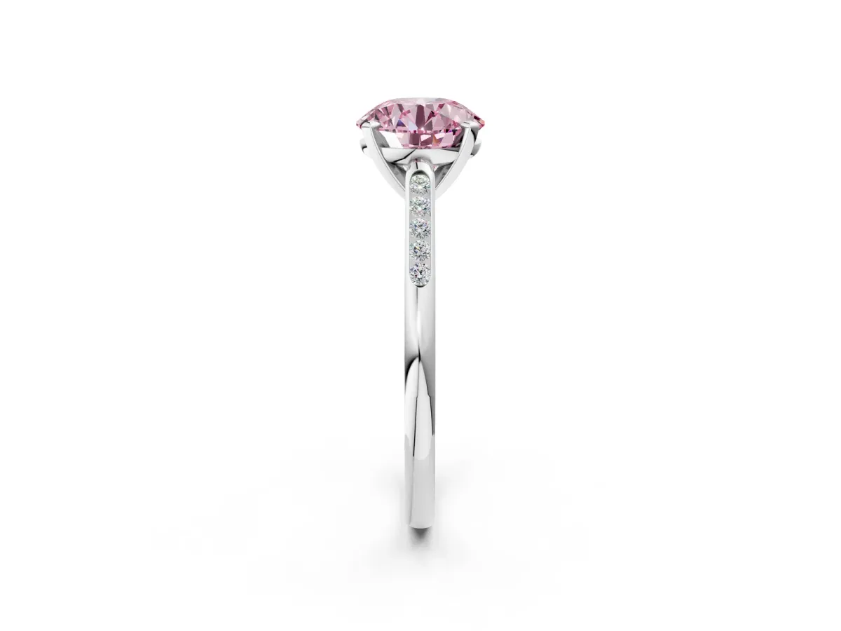 Fancy Pink Round Cut Diamond Solitaire Ring with Channel Set Round Band and Prong Setting Platinum