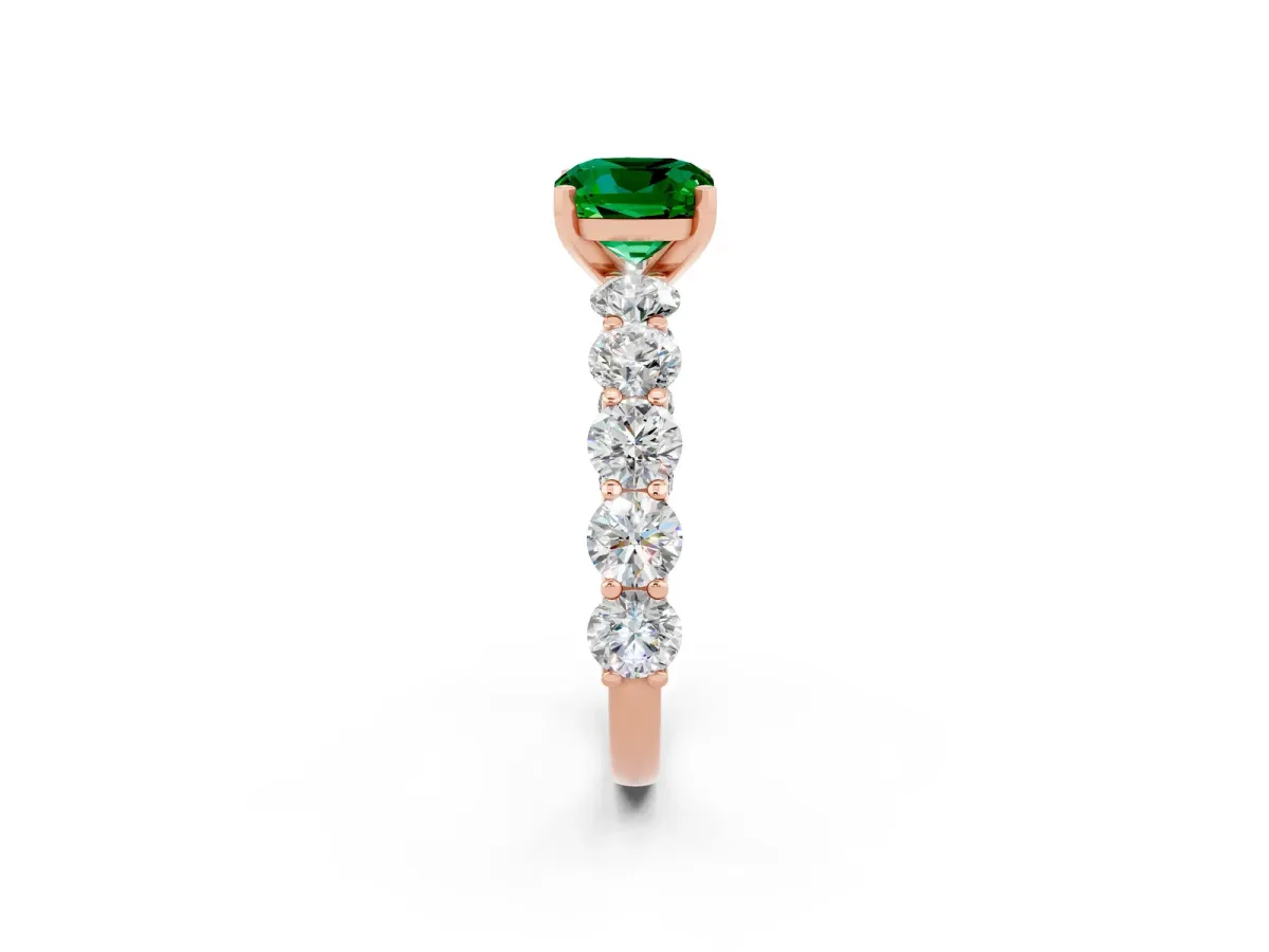 Cushion Cut Emerald Prong Setting with Side Stones on a Pave Band Rose gold