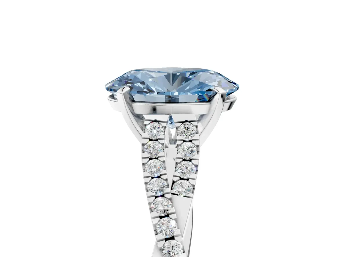 Fancy Blue Oval Cut Diamond Solitaire Engagement Ring with Twisted Pavé Band and Four-Prong Setting Silver
