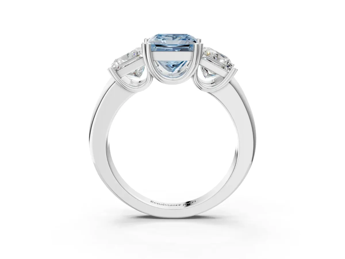Fancy Blue Three-Stone Princess Cut Cut Diamond Ring with Channel Set Band and Four-Prong Setting Silver