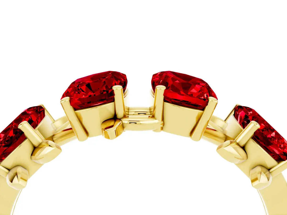 Four-Stone Elongated Cushion Ruby Band with Nature-Inspired Prong Setting Yellow gold