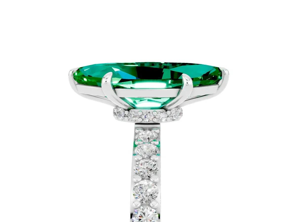 Marquise Cut Emerald Solitaire Engagement Ring with Pavé Band and Four-Prong Setting Silver