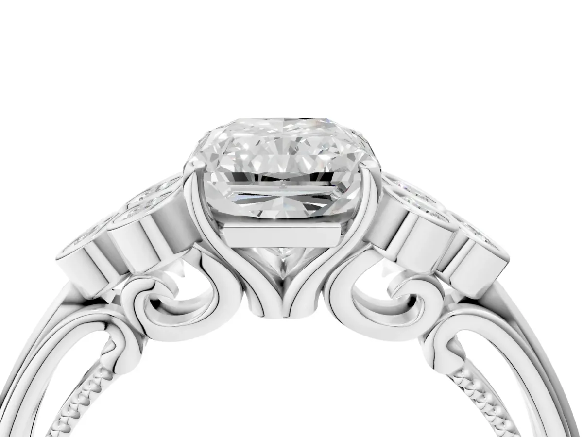 Radiant Cut Cut Diamond Engagement Ring with Bezel Set Round Side Stones and Prong Setting Platinum
