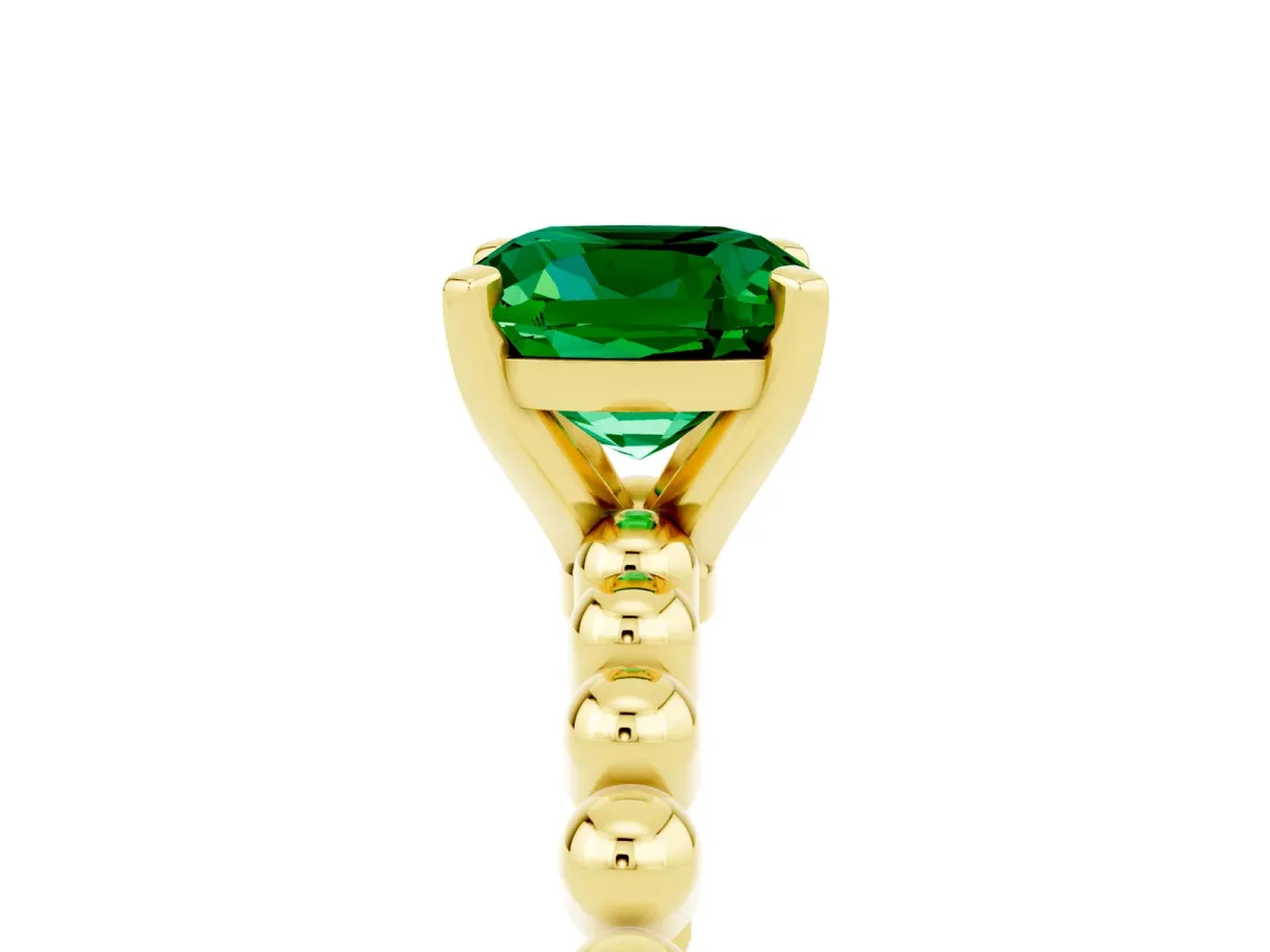 Cushion Cut Emerald Solitaire Ring with Beaded Band and Prong Setting Yellow gold