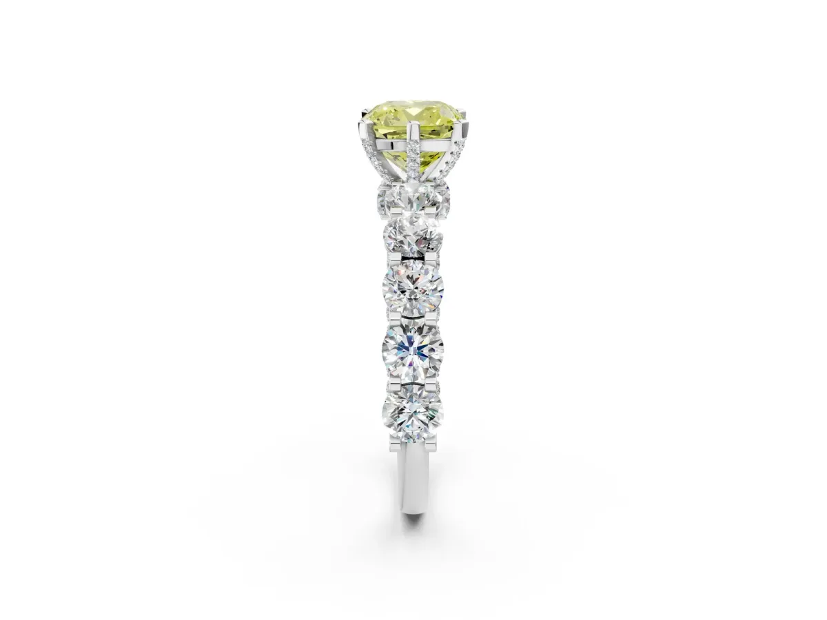Fancy Yellow Cushion Cut Diamond Side Stone Engagement Ring with Four-Prong Setting Platinum