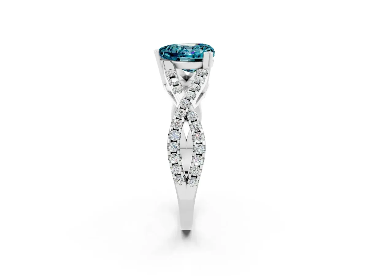 Heart Cut Blue Topaz Solitaire Ring with Four-Prong Setting and Twisted Pavé Band Silver