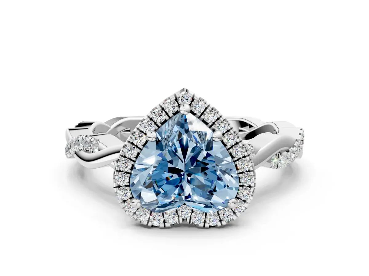 Fancy Blue Heart Cut Cut Halo Twisted Band Four-Prong Ring Platinum