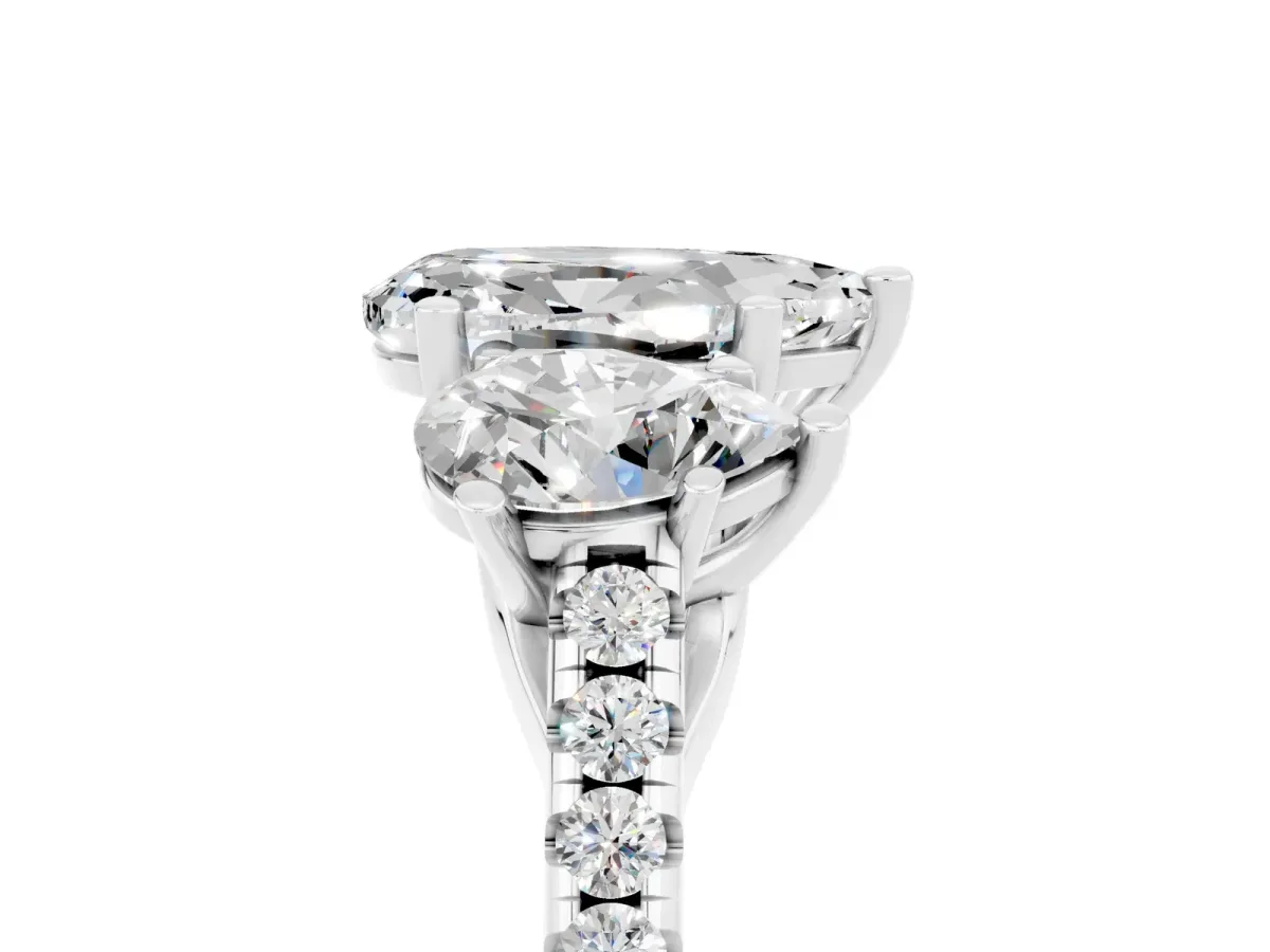 Three-Stone Pear Cut Moissanite Ring with Round Pavé Band and Prong Setting Silver