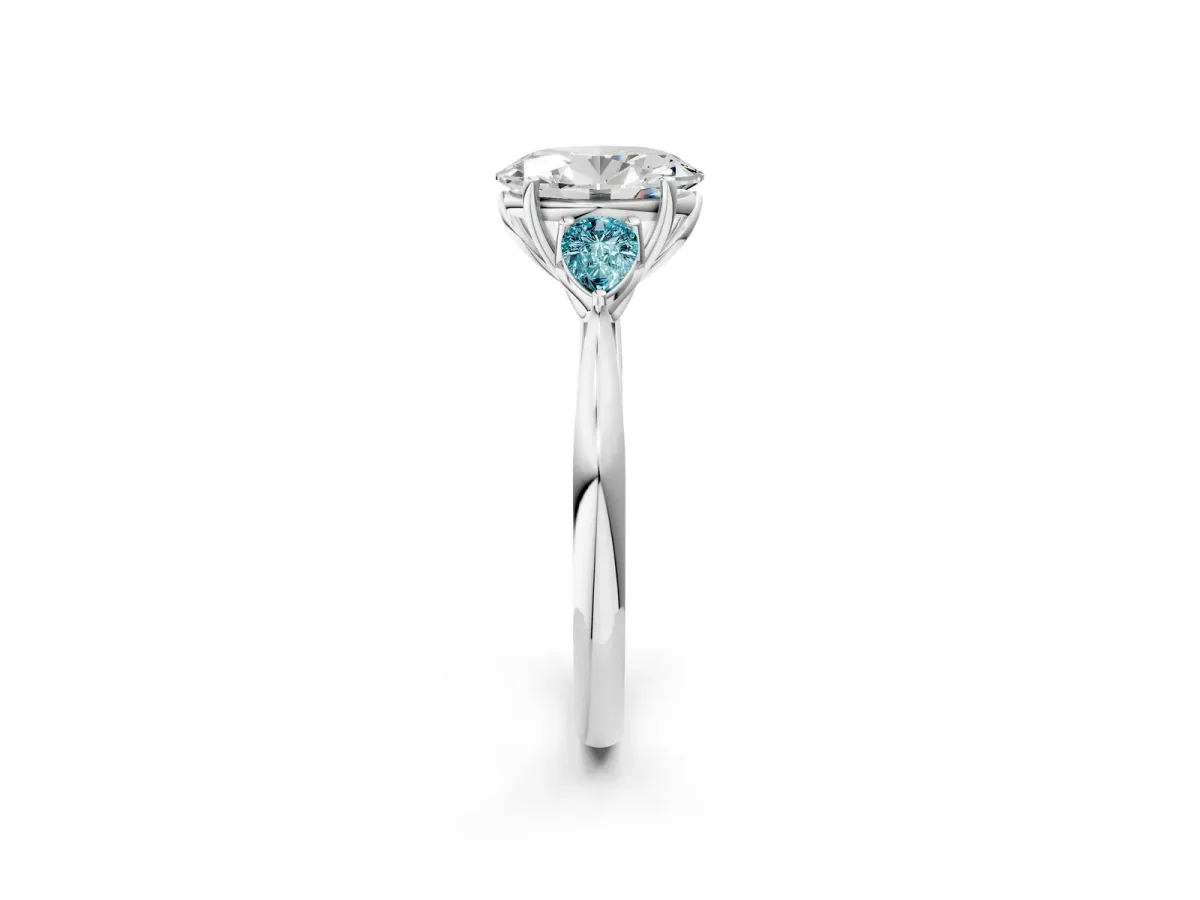 Oval Cut Diamond Three-Stone Ring with Pear Blue Topaz Side Stones and Prong Setting Silver