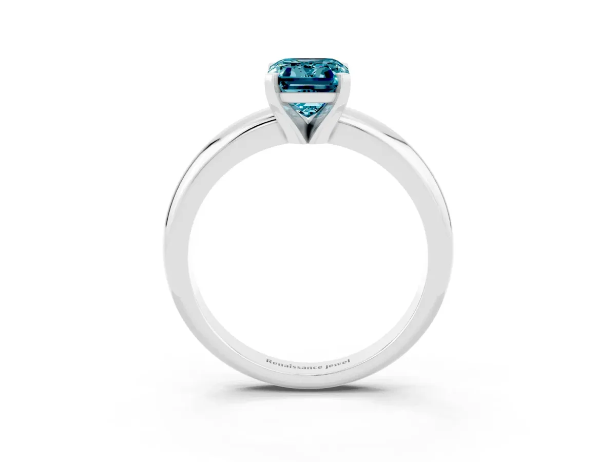 Emerald Cut Blue Topaz Solitaire Engagement Ring with Round Band and Four-Prong Setting Silver