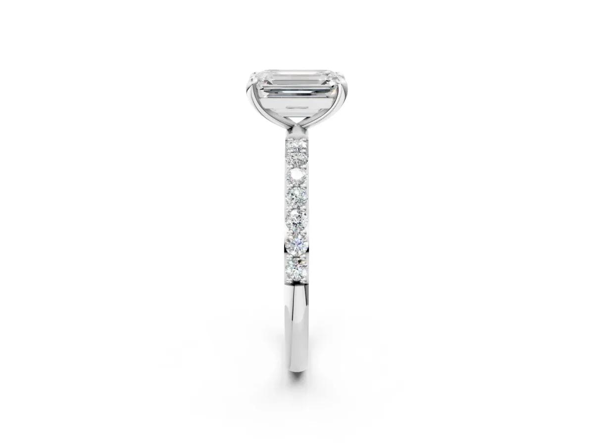 Emerald Cut Diamond Solitaire Ring with Round Moissanite Pavé Band and Prong Setting Silver