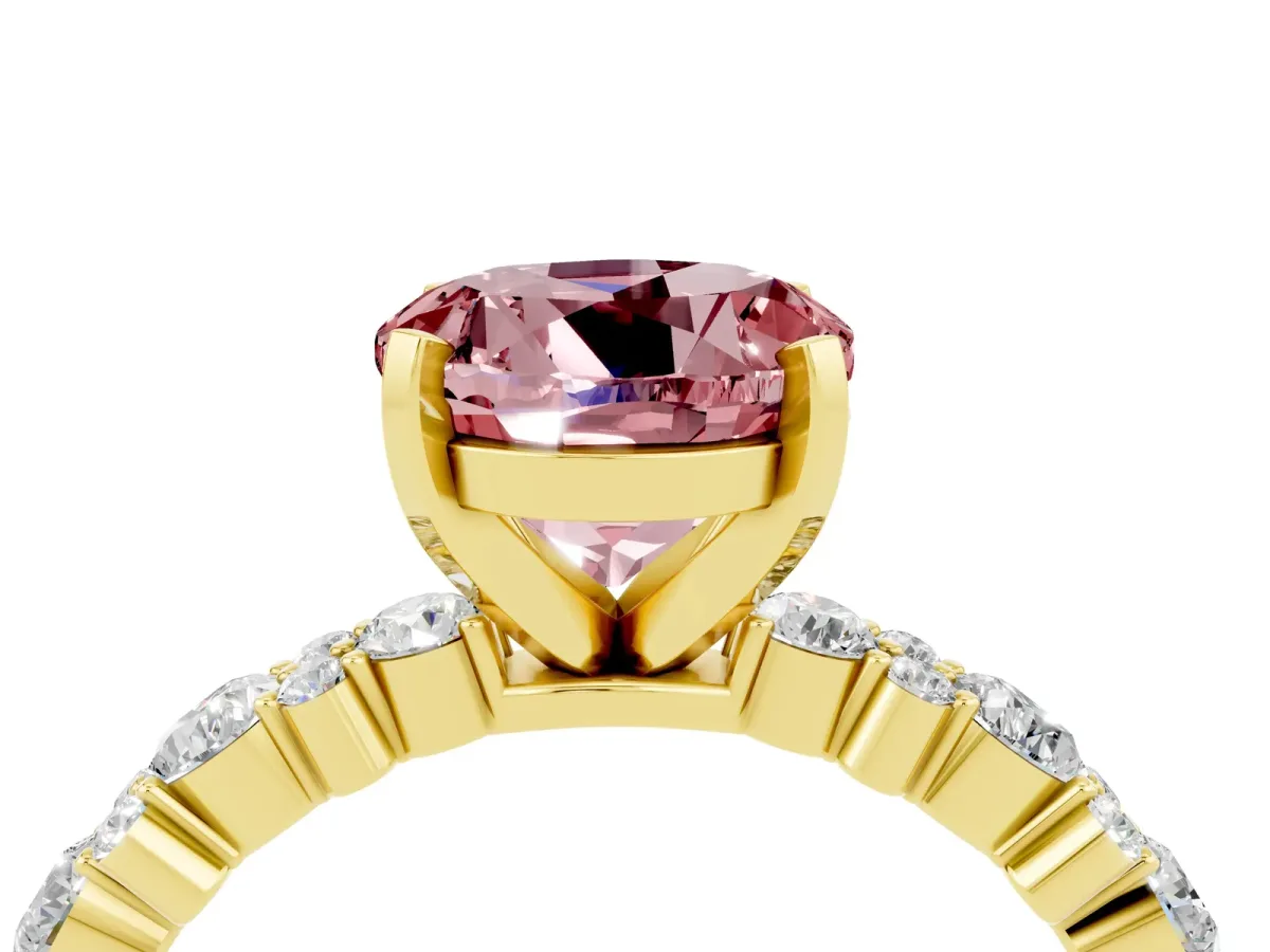 Round Cut Morganite Side Stone Solitaire Ring with Round and Four-Prong Setting Yellow gold