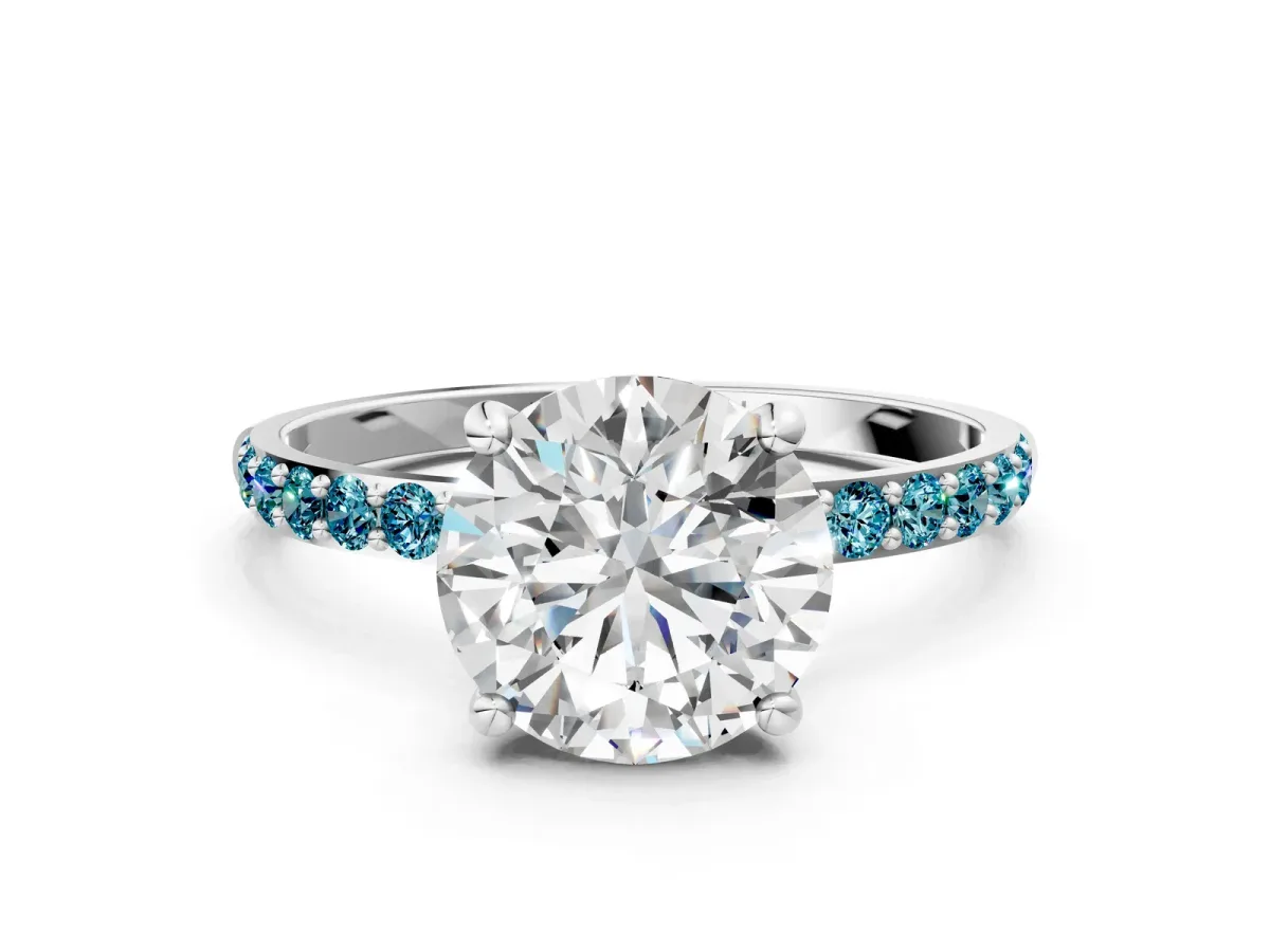 Round Cut Diamond Solitaire Ring with Round Blue Topaz Pavé Band and Prong Setting Silver